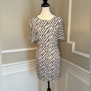 BCBG. Above Knee Open Back Mini Dress. Size 0